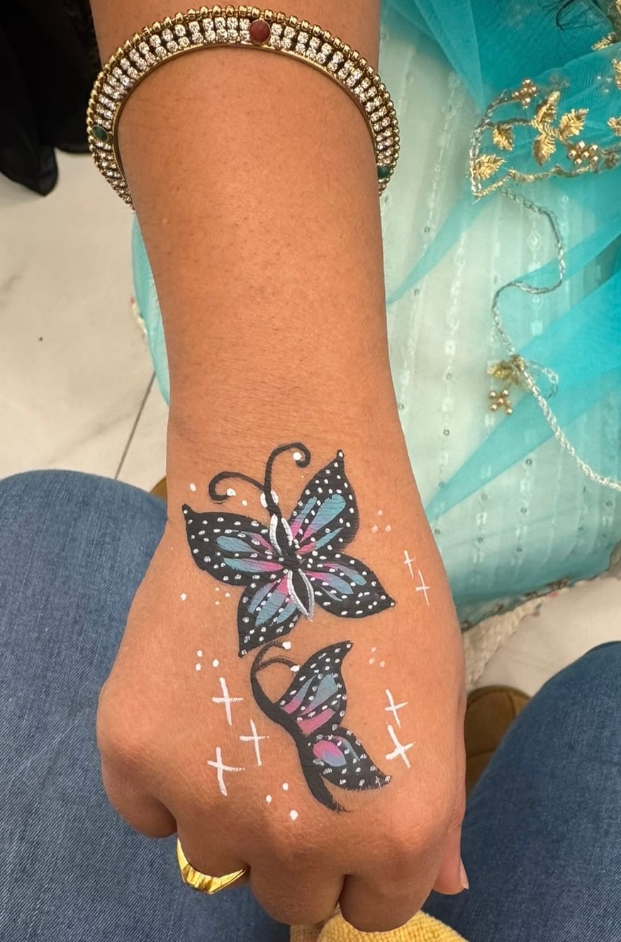 Decorative arm painting design at a Texas kids party