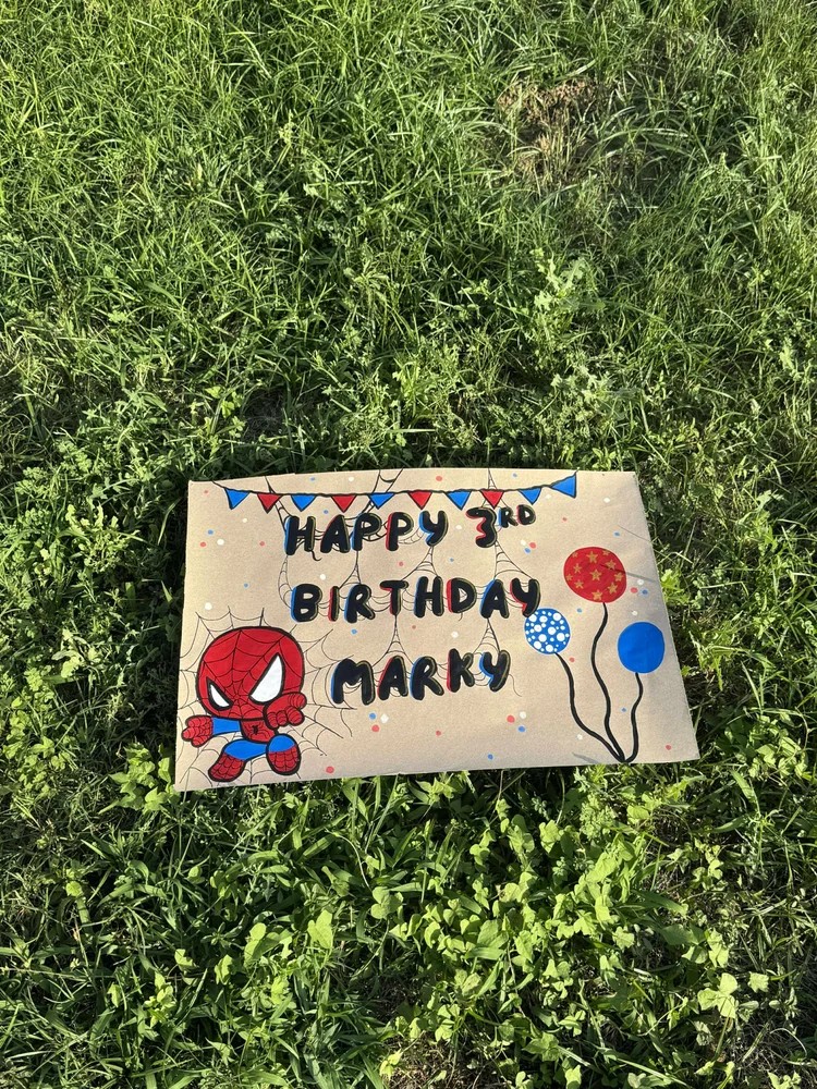 Hand-painted Spiderman birthday banner created for a Dallas Texas party by Poppin' Partiez