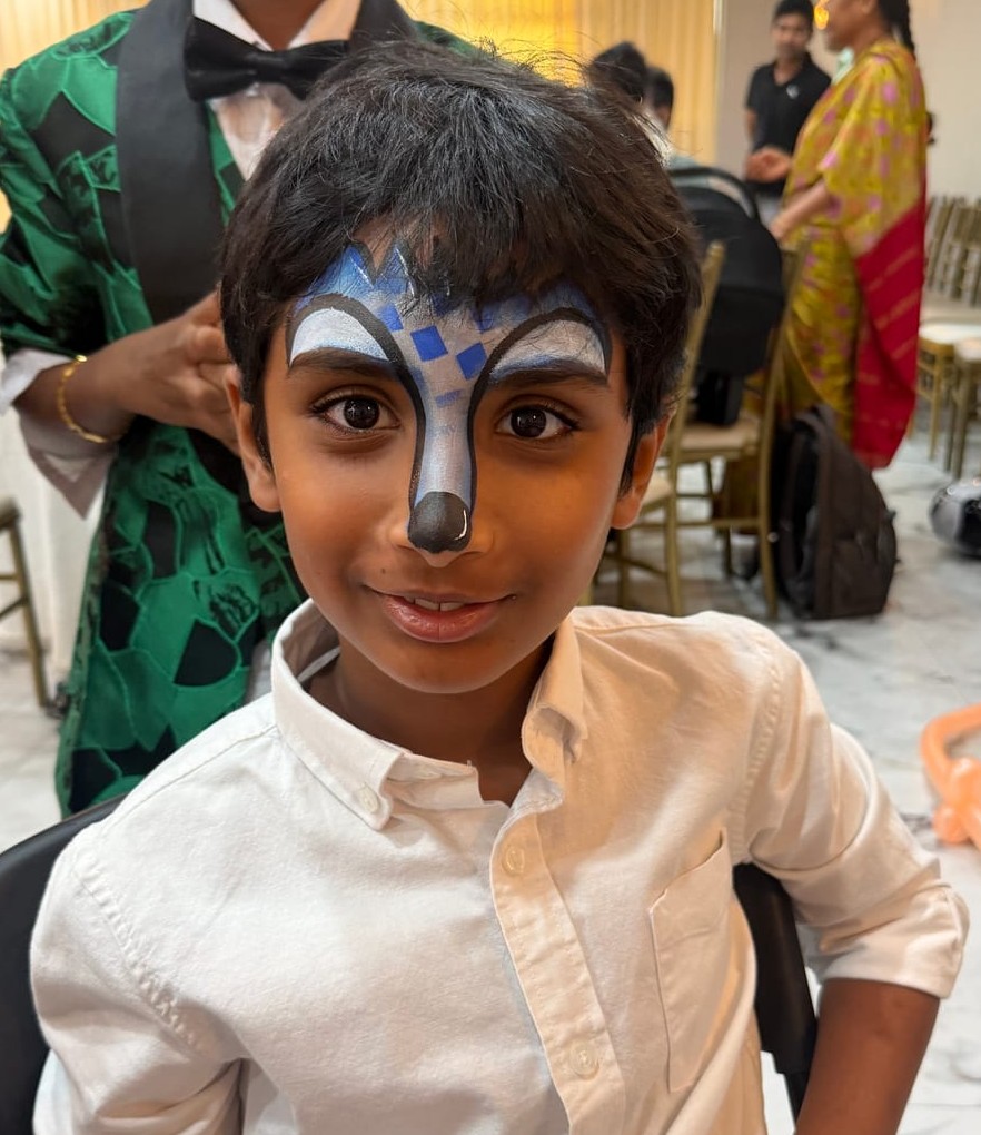 Sonic character face painting at a Texas birthday party
